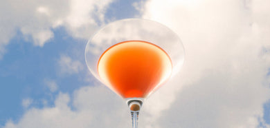 glass of Milamend Hormone Balance drink in the sky