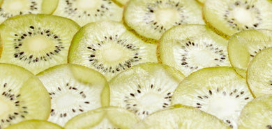 Close-up of sliced kiwis arranged in a pattern