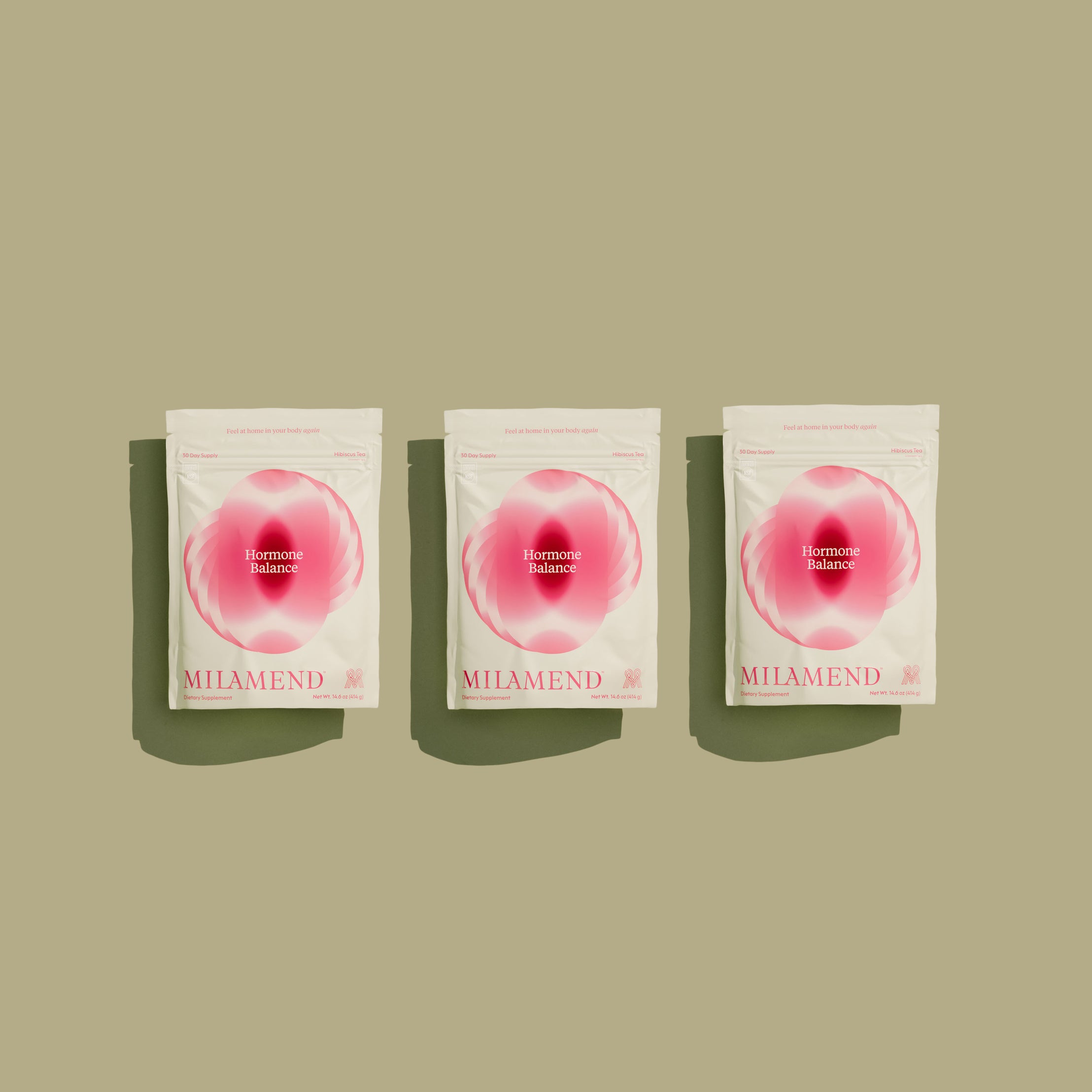 Three MIHAMEDN packets with pink circular design on a beige background
