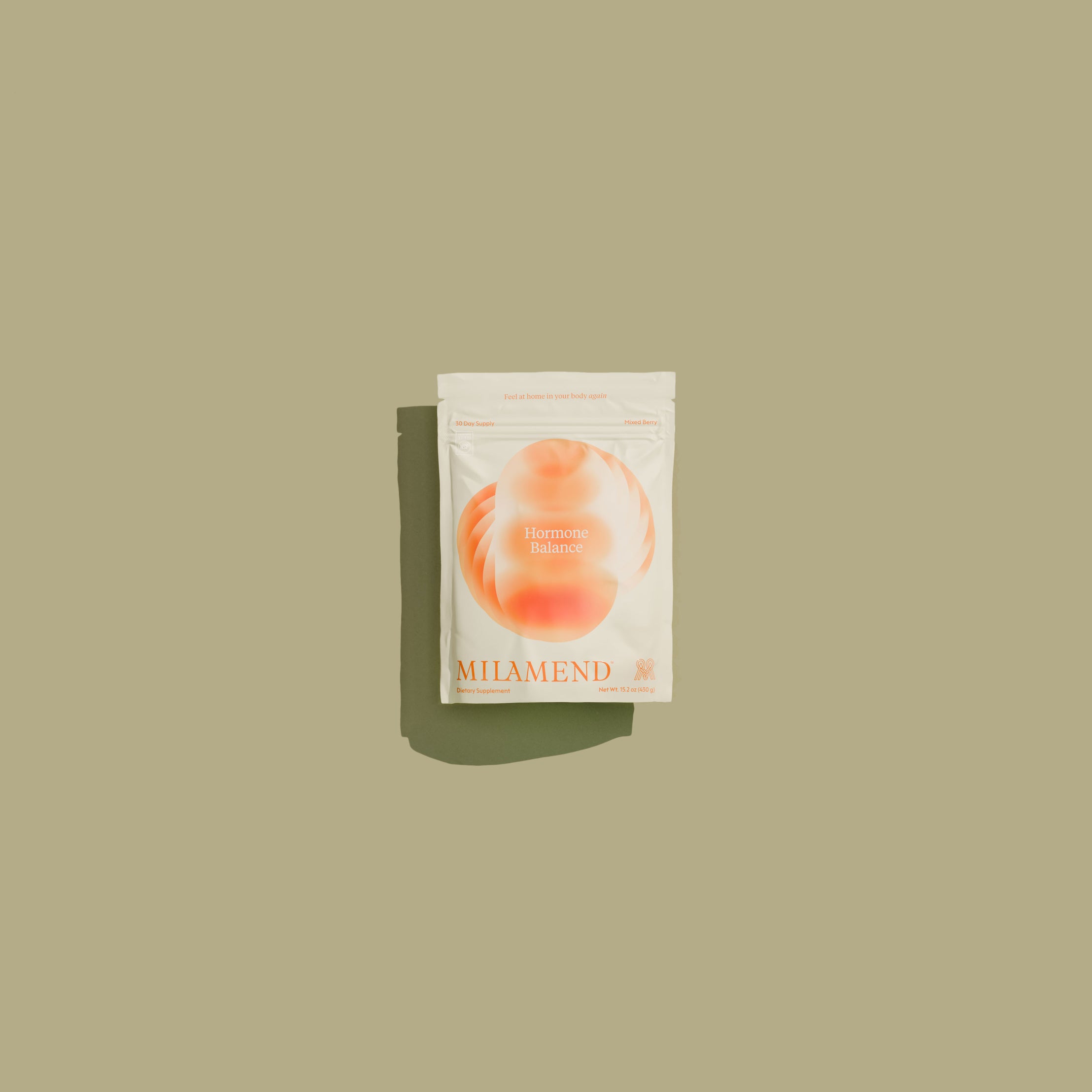 Milamend supplement packet on a beige background