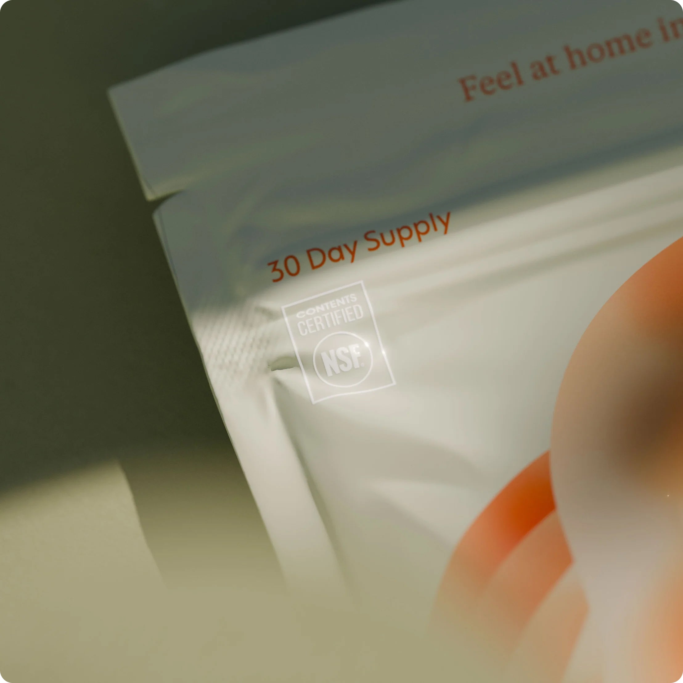 Product packaging with '30 Day Supply' and 'NSP' certification logo on a blurred background